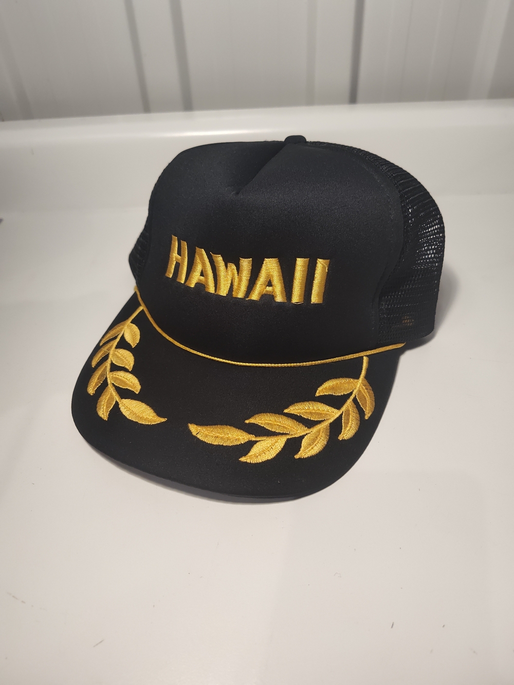 Black and Gold "Hawaii" Embroidered Trucker Hat